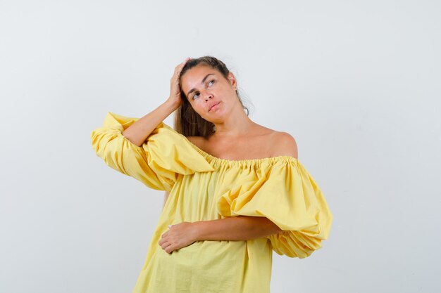 Expressive young girl posing in the studio