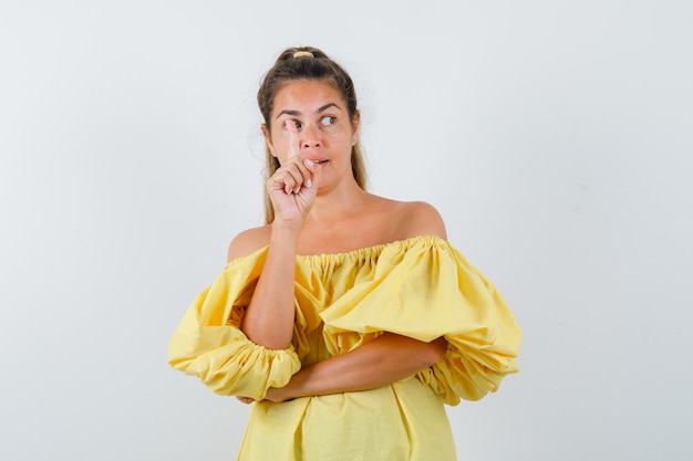 Expressive young girl posing in the studio