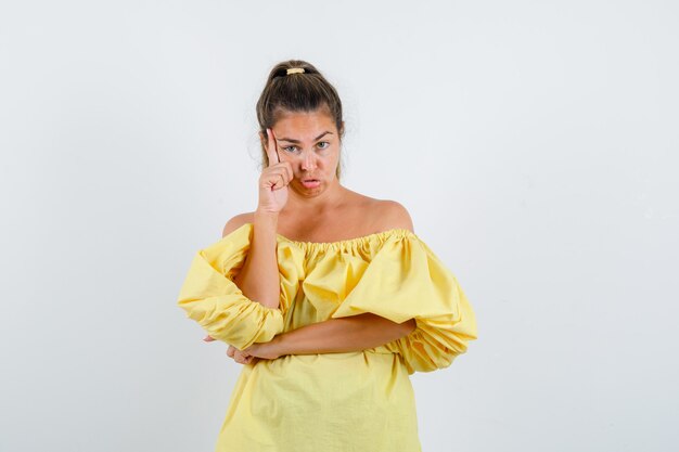 Expressive young girl posing in the studio