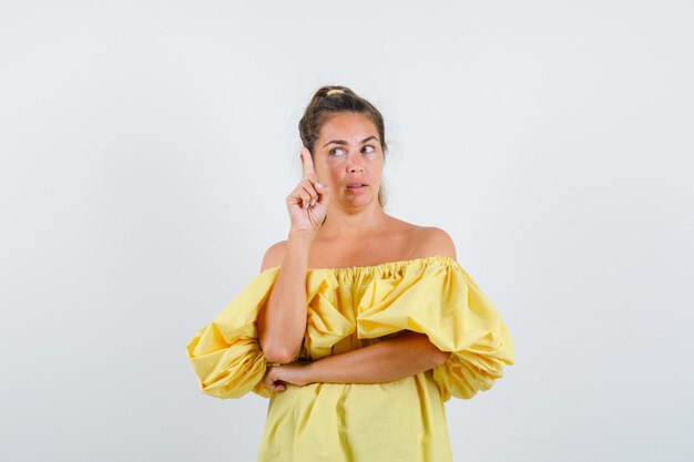 Expressive young girl posing in the studio