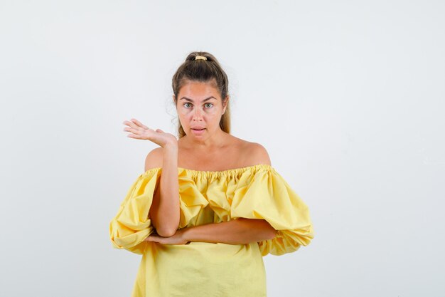 Expressive young girl posing in the studio