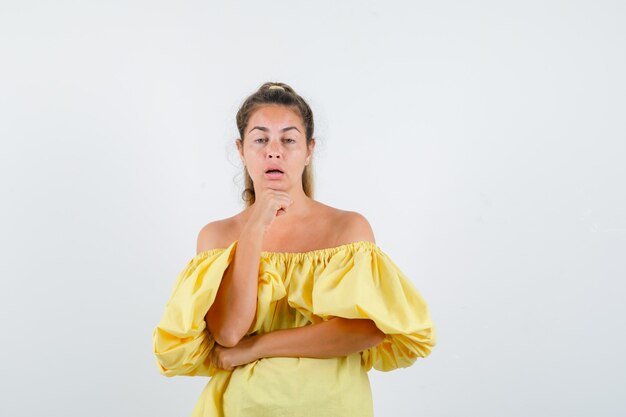 Expressive young girl posing in the studio