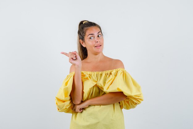 Expressive young girl posing in the studio