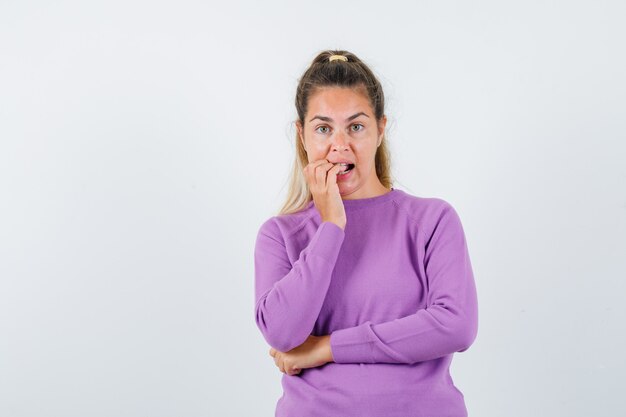 Expressive young girl posing in the studio