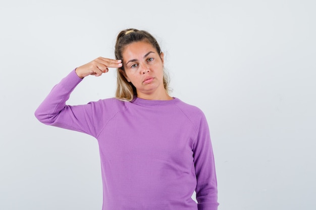 Expressive young girl posing in the studio