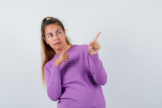 Expressive young girl posing in the studio