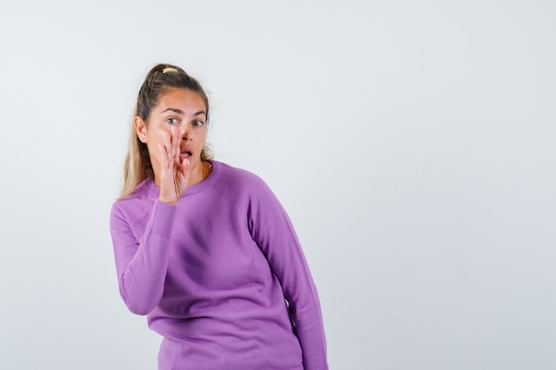 Expressive young girl posing in the studio