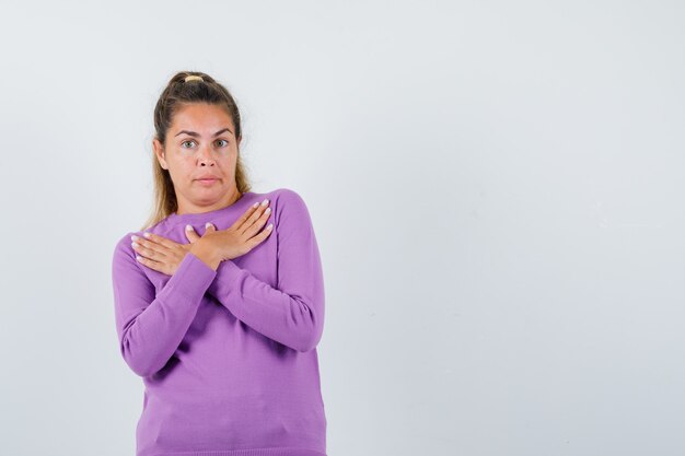 Expressive young girl posing in the studio