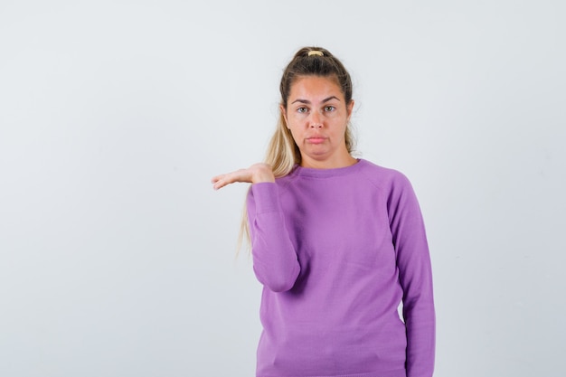 Expressive young girl posing in the studio