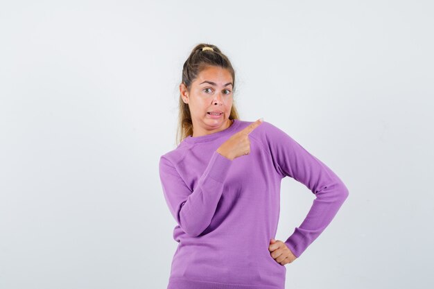 Expressive young girl posing in the studio