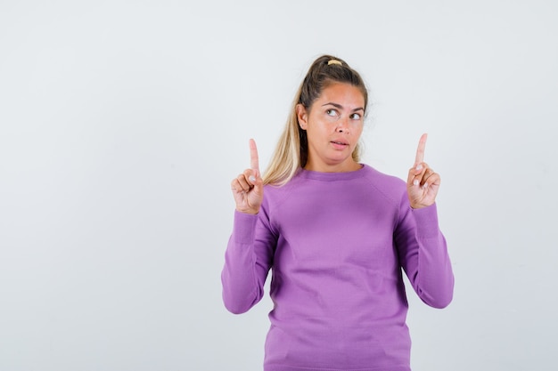 Expressive young girl posing in the studio