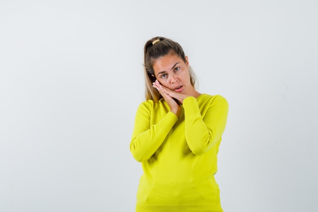 Expressive young girl posing in the studio