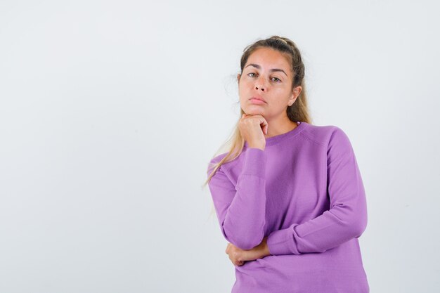 Expressive young girl posing in the studio