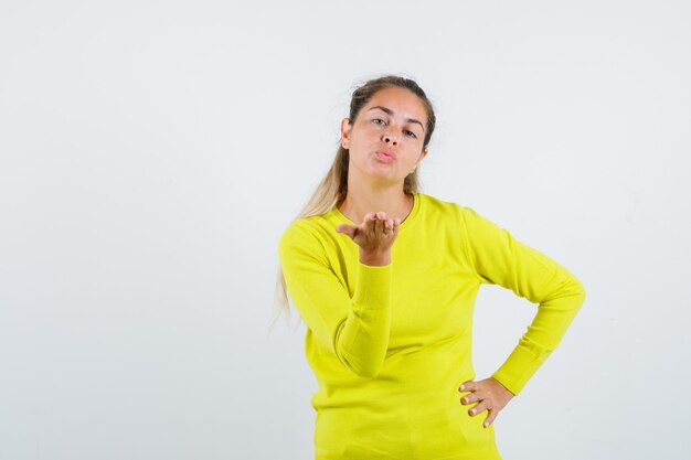 Expressive young girl posing in the studio