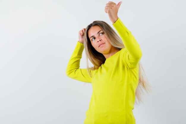 Expressive young girl posing in the studio