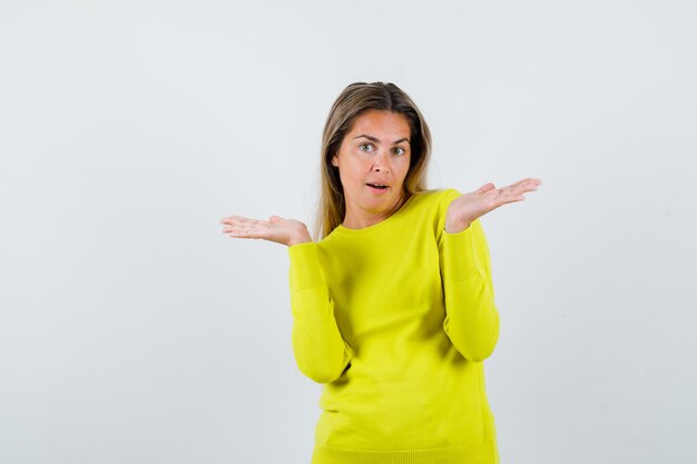 Expressive young girl posing in the studio