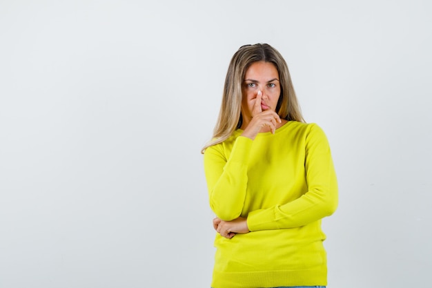 Expressive young girl posing in the studio