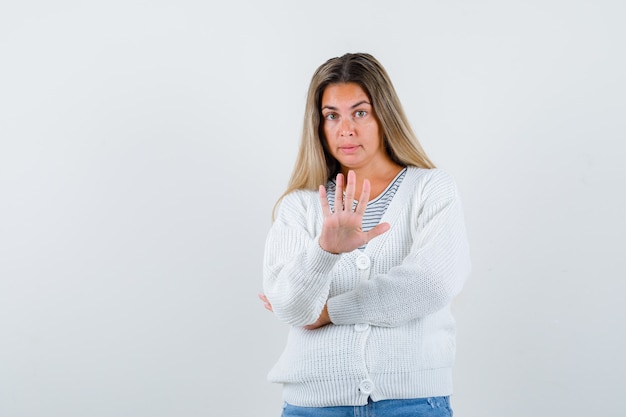 Expressive young girl posing in the studio