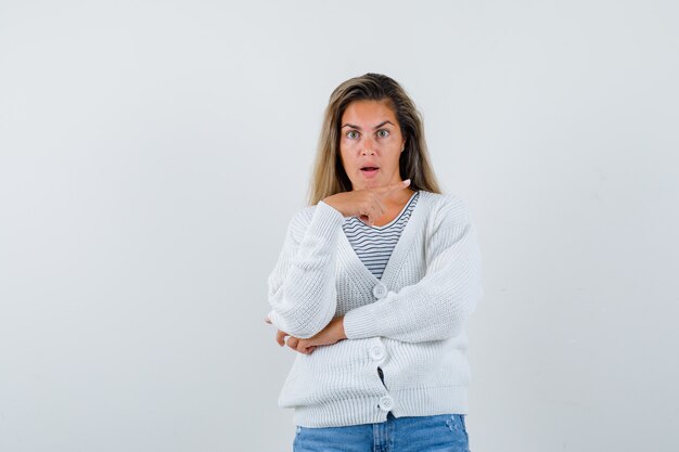 Expressive young girl posing in the studio