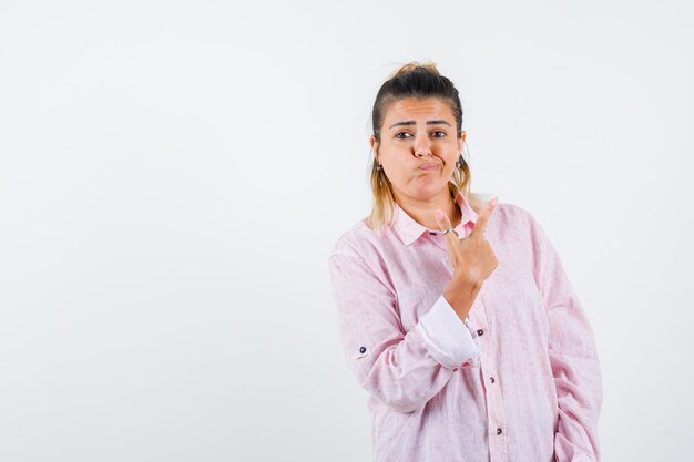 Expressive young girl posing in the studio