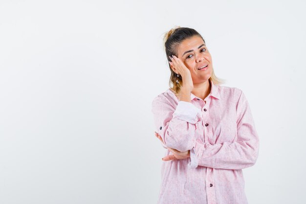 Expressive young girl posing in the studio