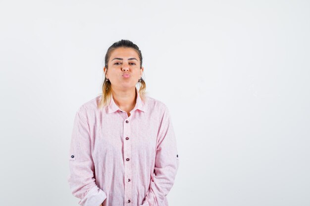 Expressive young girl posing in the studio