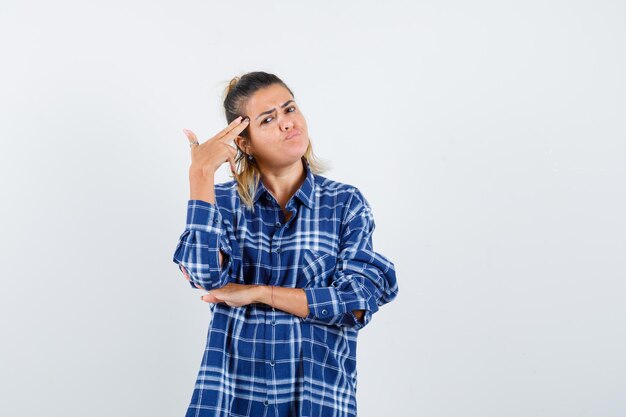 Expressive young girl posing in the studio