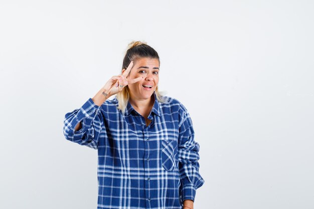 Expressive young girl posing in the studio