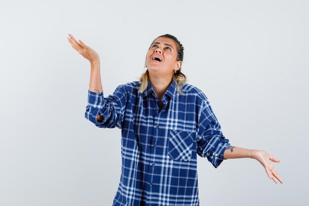 Expressive young girl posing in the studio