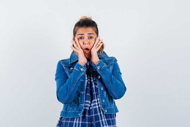 Expressive young girl posing in the studio