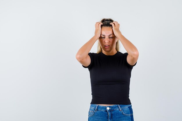 Expressive young girl posing in the studio