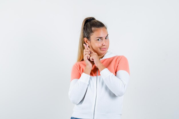 Expressive young girl posing in the studio