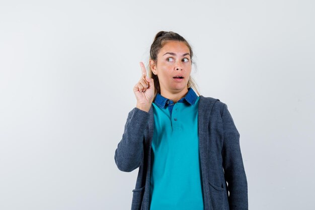 Expressive young girl posing in the studio