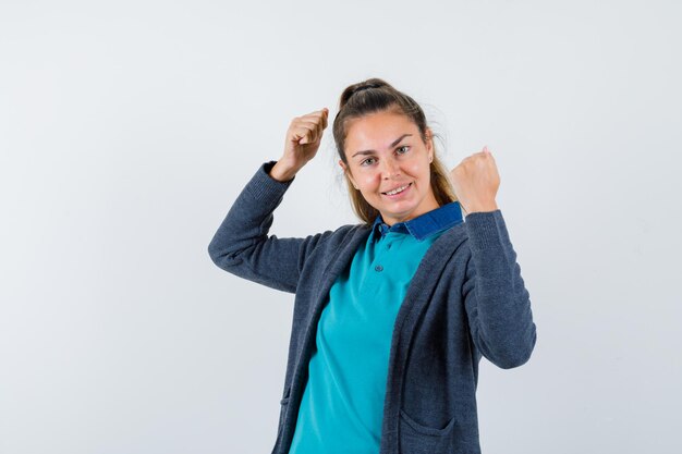 Expressive young girl posing in the studio