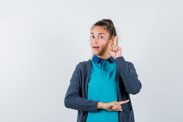 Expressive young girl posing in the studio