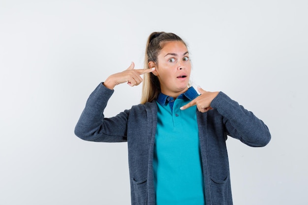 Expressive young girl posing in the studio