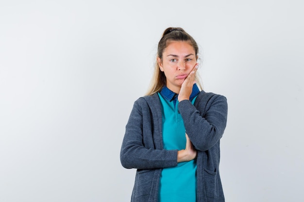 Expressive young girl posing in the studio