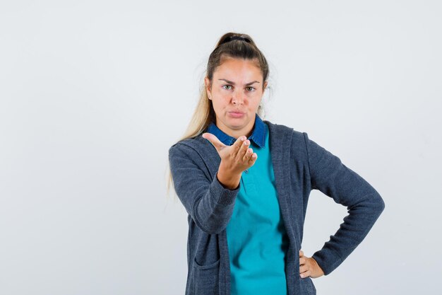 Expressive young girl posing in the studio