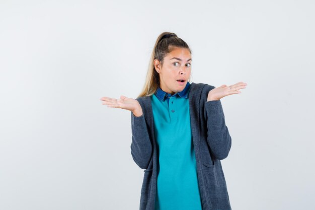 Expressive young girl posing in the studio