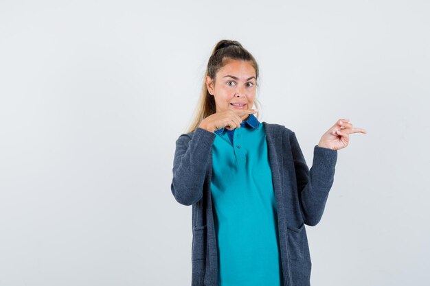 Expressive young girl posing in the studio