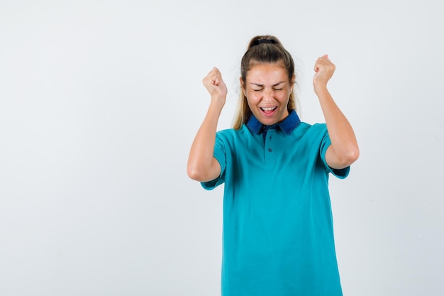 Expressive young girl posing in the studio