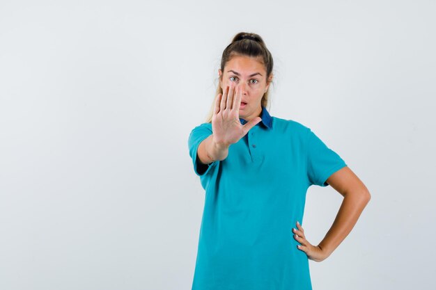 Expressive young girl posing in the studio