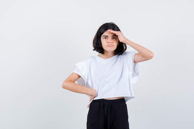 Expressive young girl posing in the studio