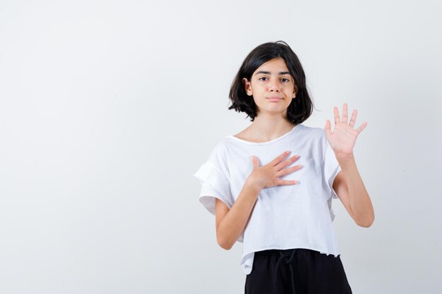 Expressive young girl posing in the studio