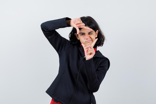 Expressive young girl posing in the studio