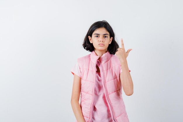 Expressive young girl posing in the studio