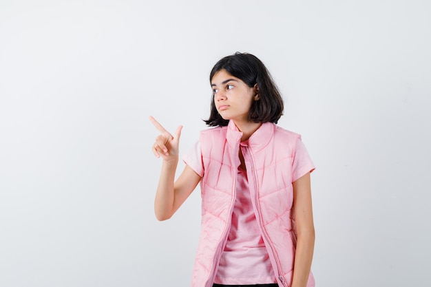 Expressive young girl posing in the studio