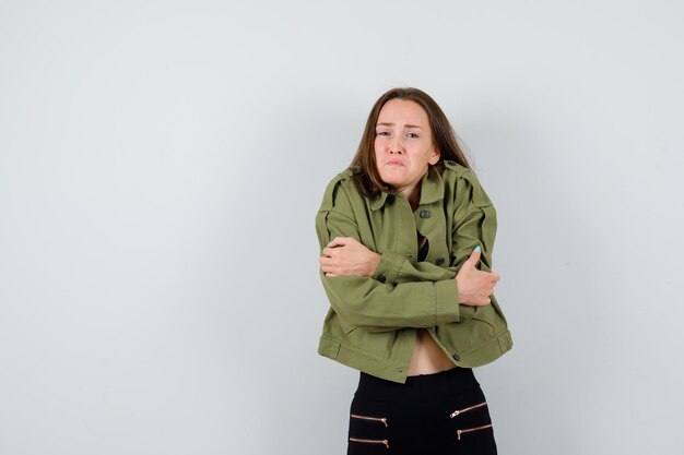 Expressive young girl posing in the studio