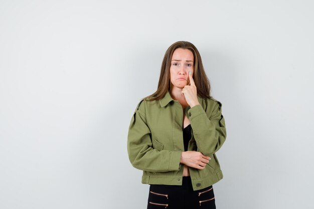 Expressive young girl posing in the studio