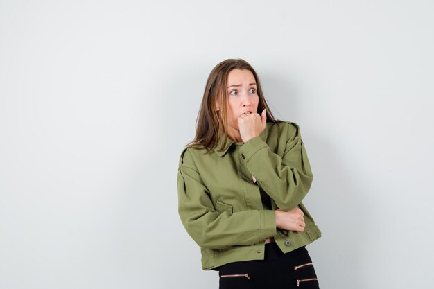 Expressive young girl posing in the studio